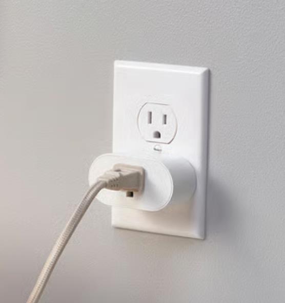 A power cord plugged into a wall outlet.